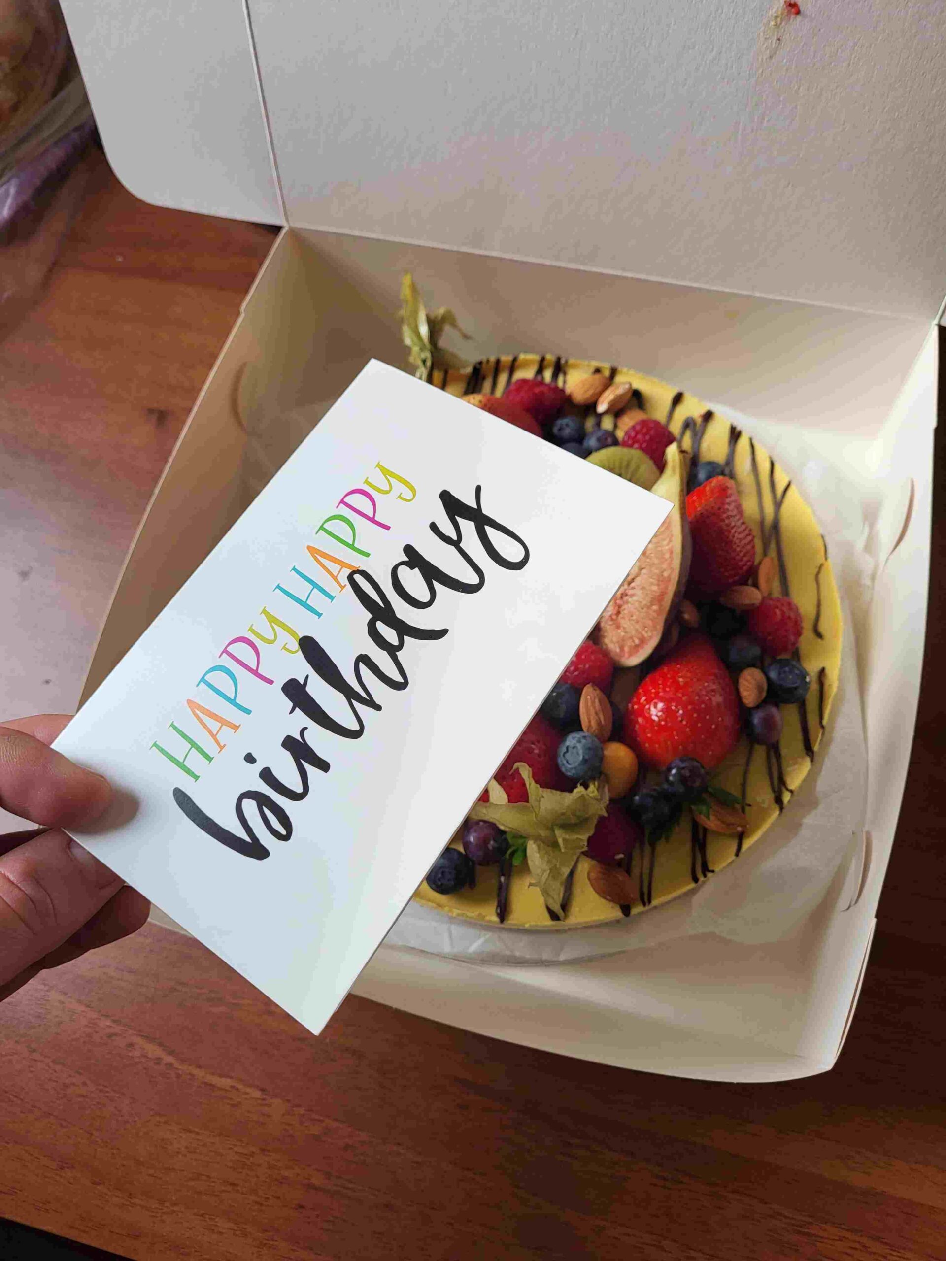 An amazing handwritten greeting card with a vegan cake